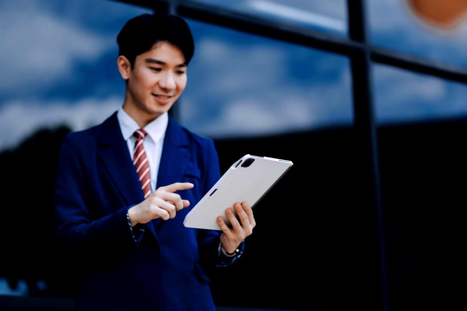 Professional business planning session with financial documents and charts